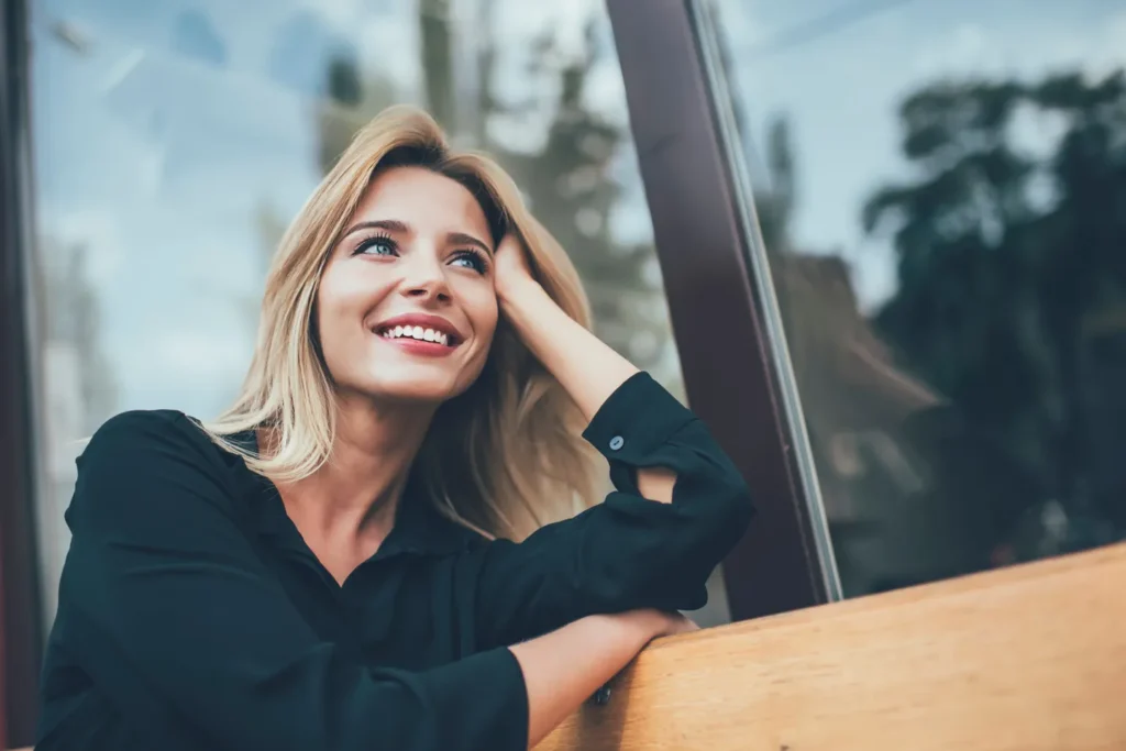 Young woman outside on a bench